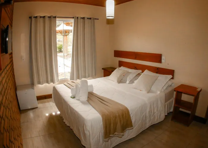 Pousada Rural Pavão - Suites e Chalés